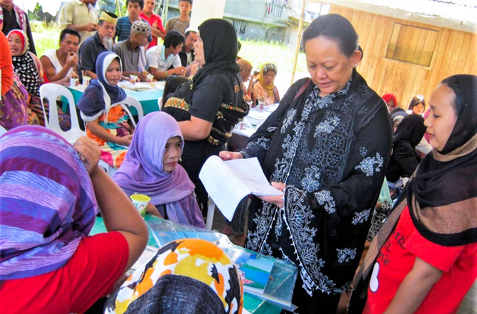 Ms. Amina Rasul, second from right, is at the Monitoring Literacy for Peace and Development event in Cotabato City, Maguindanao, Philippines in 2014. Photo: Philippines Centre for Islam and Democracy